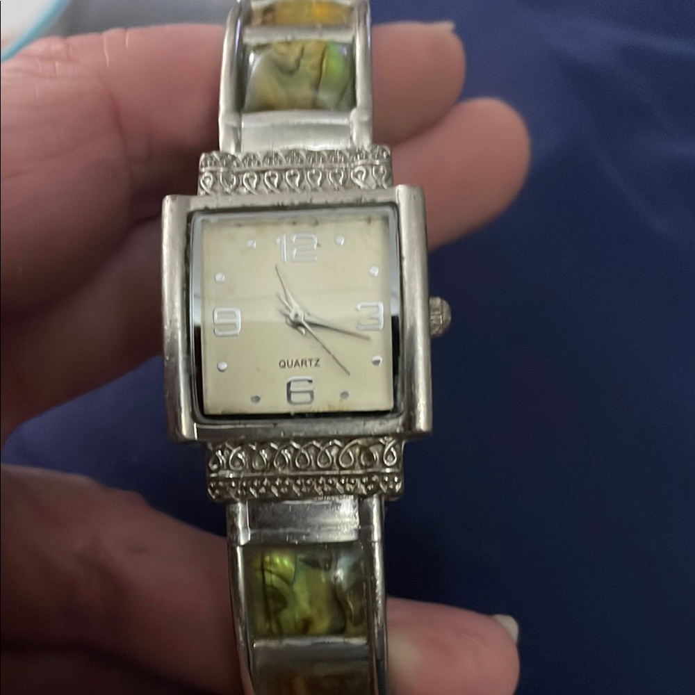 Silver and Cream Elegant Watch with Rectangular Face and Decorative Stones